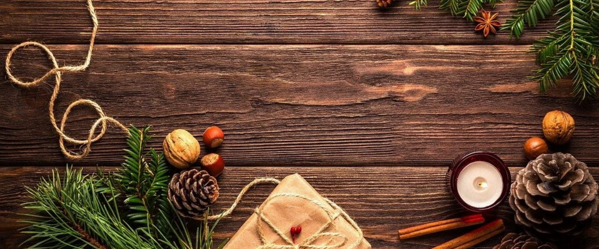 an aerial shot of christmas decorations on a wooden table2